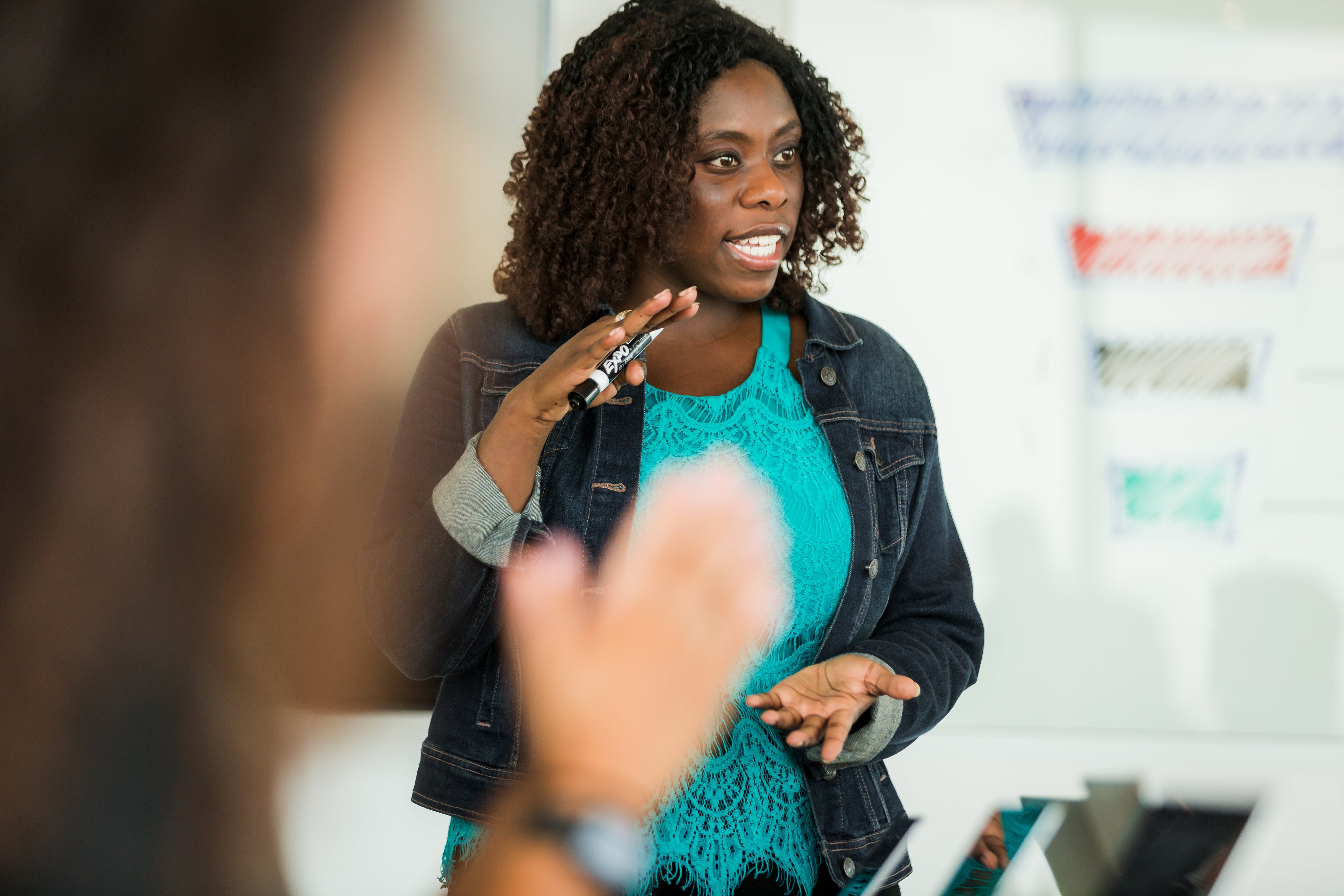 files/woman-talking-during-meeting.jpg